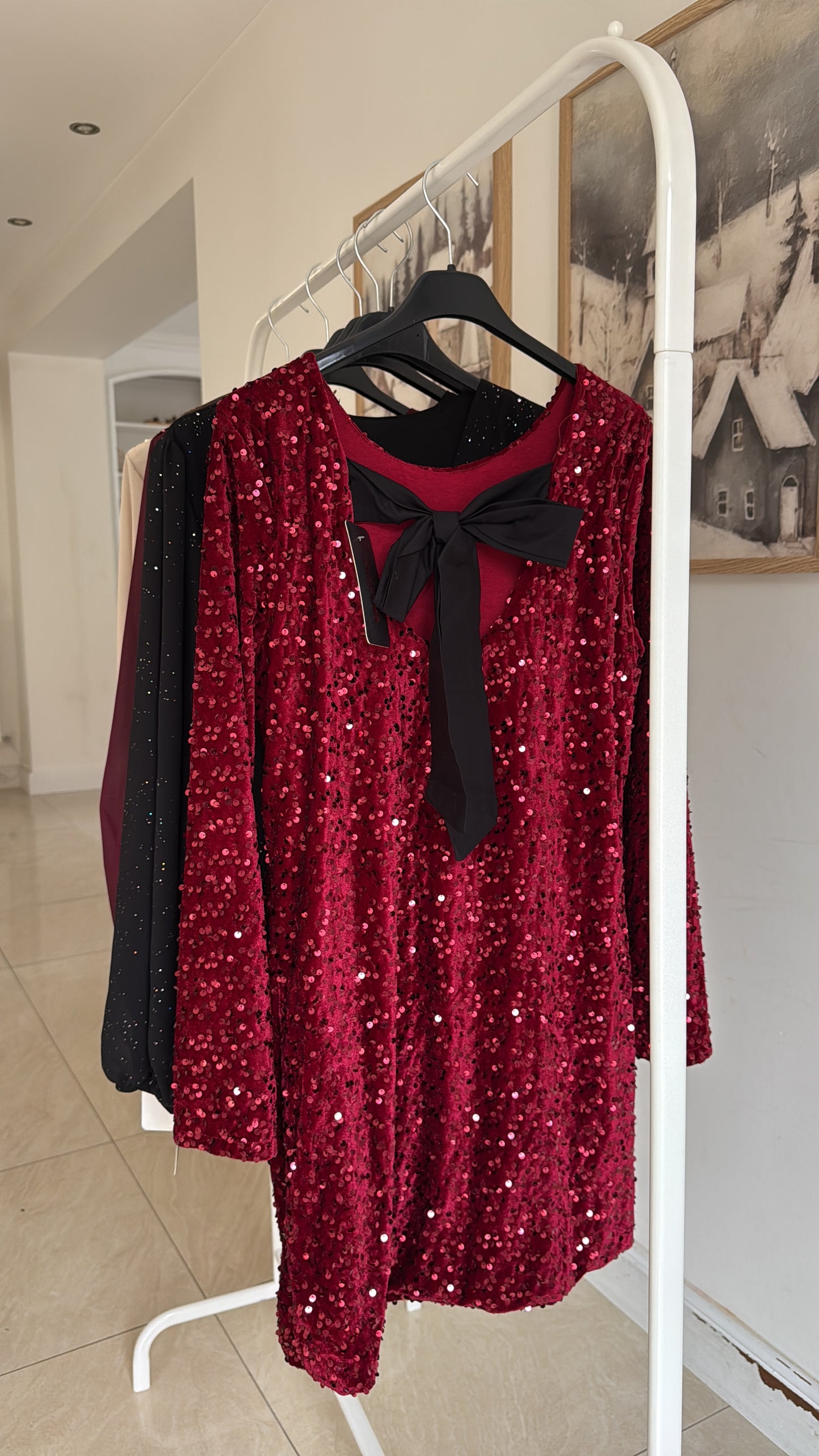 Robe à sequins avec noeud au dos