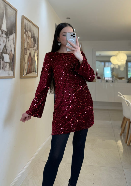 Robe à sequins avec noeud au dos