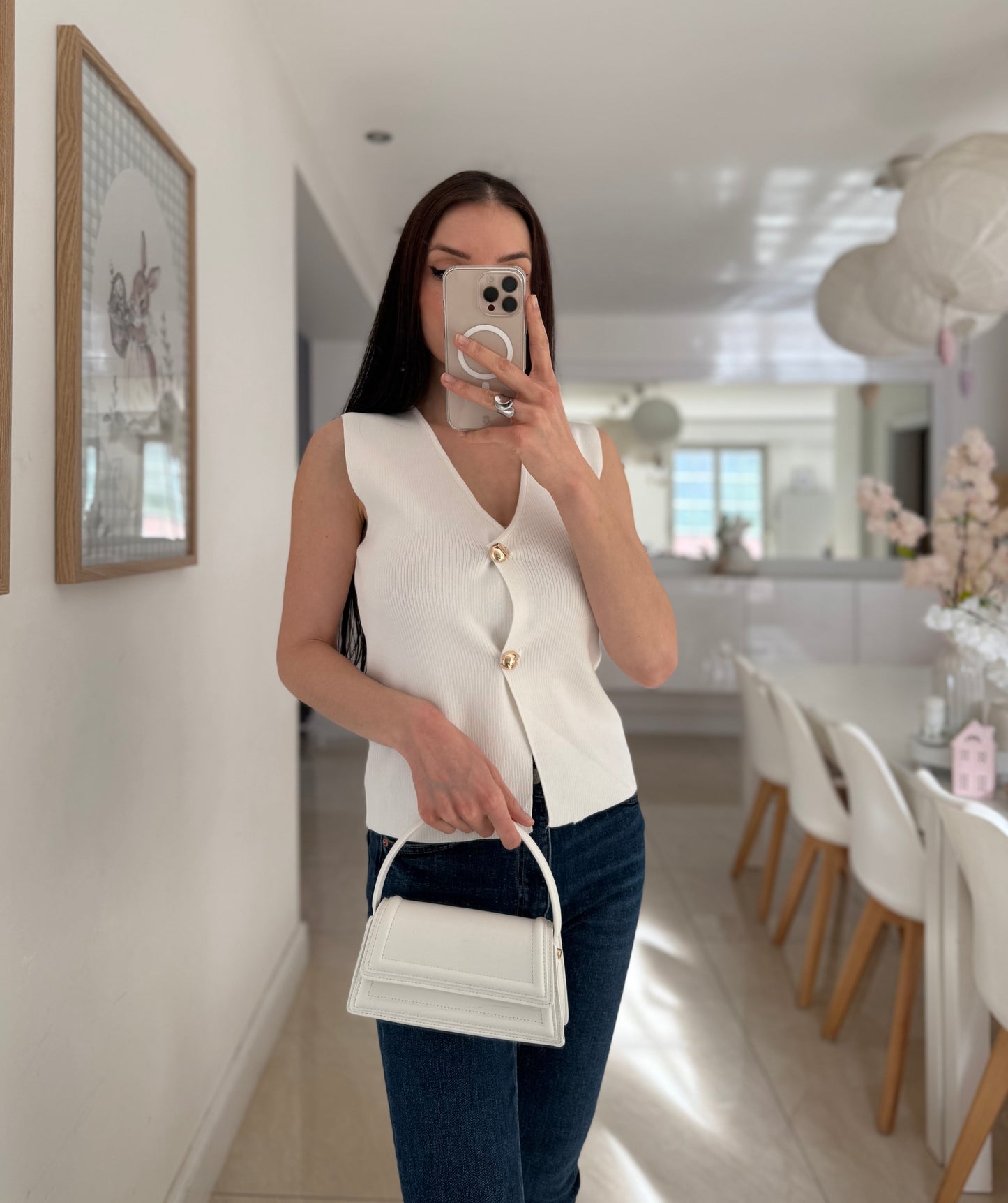 Top sans manches avec boutons dorés