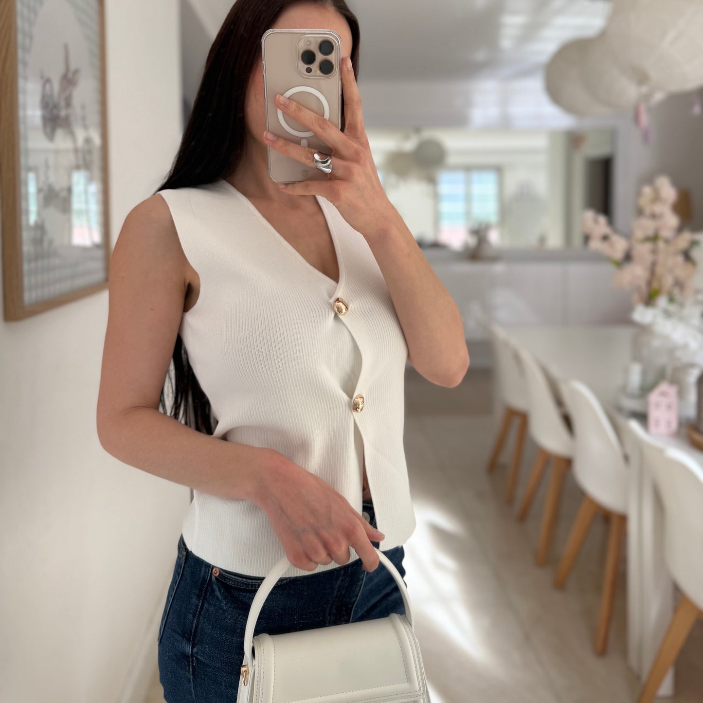 Top sans manches avec boutons dorés